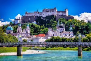 Hohensalzburg Fortress rises above the historic old town of Salzburg in Austria.